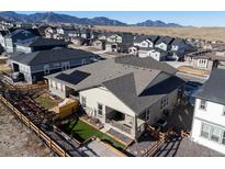 Charming single-Gathering home featuring a well-maintained yard and mountain views in a suburban neighborhood at 17412 W 93Rd Pl, Arvada, CO 80007