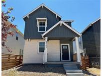 Charming two-story home featuring a stylish front door and modern architectural details at 23782 E 33Rd Pl, Aurora, CO 80019