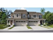 Charming duplex with attached garages and professionally landscaped front lawns at 6739 Juniper Dr, Thornton, CO 80602