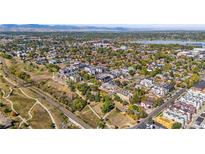Stunning aerial view of the neighborhood showcasing a mix of residential and commercial properties near Sloan's Lake at 1287 Quitman St, Denver, CO 80204