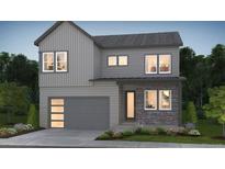 Charming two-story home featuring gray siding, a two-car garage, and a welcoming front entrance with a light-brick facade at 1287 Stillspring Ln, Castle Pines, CO 80108