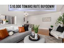 Inviting living room with modern decor, comfortable seating, and stylish accents at 1454 Jersey St # 104, Denver, CO 80220