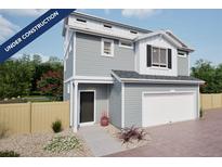 Charming two-story home with gray siding, white trim, and a convenient attached garage at 46517 Sunflower Ln, Bennett, CO 80102