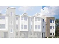 Rendering of a modern three-story townhome with mixed materials facade and large windows at 14225 Currant St, Broomfield, CO 80020