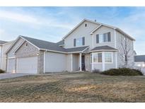 Lovely home featuring a spacious three-car garage, perfect for a growing Gathering at 11413 Oswego St, Commerce City, CO 80640