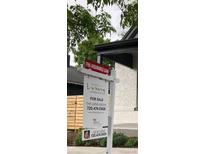 Real estate sign indicating an FHA assumable loan for this Keller Williams Luxury International property at 3817 Osage St, Denver, CO 80211