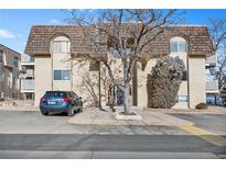 Attractive exterior of a multi-unit building with parking at 7645 E Quincy Ave # 105, Denver, CO 80237