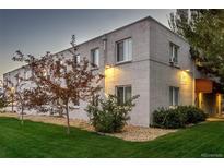 Charming building with well-maintained lawn and attractive landscaping at 2480 W Caithness Pl # 5, Denver, CO 80211