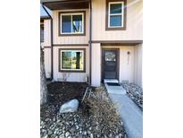 Charming exterior view of a townhome, showcasing its well-maintained facade and inviting entrance at 3552 S Kittredge St # C, Aurora, CO 80013