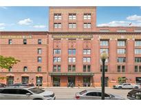 A captivating shot of the historic, brick Ice House building, showcasing its classic architecture and unique urban charm at 1801 Wynkoop St # 208, Denver, CO 80202