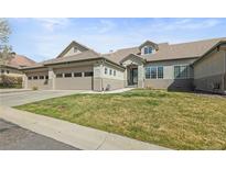 Charming single-Gathering home with a well-manicured lawn and a three car garage at 3425 W 111Th Loop # B, Westminster, CO 80031