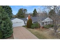 Charming ranch-style home featuring a spacious driveway and well-maintained landscaping at 3201 S Albion St, Denver, CO 80222