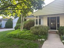 Charming home with a well-maintained front yard and walkway leading to the inviting front entrance at 3201 S Albion St, Denver, CO 80222