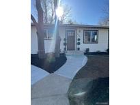 Charming single-story home with tidy landscaping and a welcoming front entrance at 409 N Finch Ave, Lafayette, CO 80026