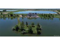 Luxury home on private island with lake views and pool at 4789 County Road 24 3/4, Longmont, CO 80504