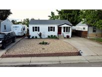 Charming single-story home with a gravel front yard, RV parking, and inviting curb appeal at 3111 W Bails Pl, Denver, CO 80219