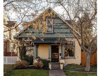 Charming single-Gathering home with mature landscaping and inviting front porch in a desirable neighborhood at 368 S Humboldt St, Denver, CO 80209