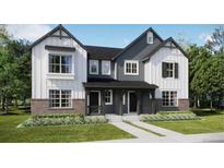 Charming modern two-story home featuring a landscaped yard, and a delightful covered entry at 15218 Detroit St, Thornton, CO 80602