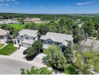 Beautiful two-story home with mature trees and manicured lawn in a desirable neighborhood at 787 Eldorado Dr, Superior, CO 80027