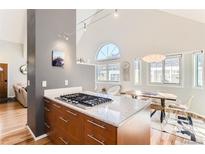 Modern kitchen features granite countertops and stainless steel appliances at 4861 Curie Ct, Boulder, CO 80301