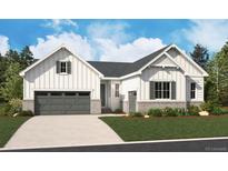 Charming single-story home with white siding, gray accents, well-manicured lawn, and a two-car garage at 1645 Green Fern Pt, Castle Rock, CO 80104