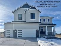 Inviting two-story home with a spacious two-car garage and attractive modern design at 42984 Colonial Trl, Elizabeth, CO 80107