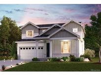Charming two-story home with a manicured lawn, covered entry and an attached two car garage at 14378 Heritage Dr, Mead, CO 80504