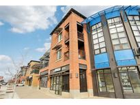 Brick building exterior, multiple storefronts and apartments at 4520 Broadway St # 208, Boulder, CO 80304