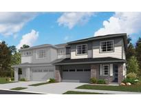 Modern two-story home boasts stone accents, neutral siding, and a dark roof, set against a backdrop of lush trees at 6616 N Nepal St, Aurora, CO 80019