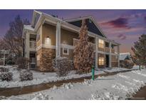 Exterior of two-story building with snow on the ground at 8200 E 8Th Ave # 2102, Denver, CO 80230