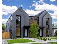 Contemporary duplex featuring a modern facade, manicured lawn, and professionally landscaped front yard at 2478 S Cherokee St, Denver, CO 80223