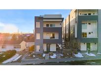 Contemporary three-story townhome with modern design at 1245 N Utica St # 103, Denver, CO 80204