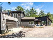 Stunning home features a three-car garage and second story balcony at 37 Wagner Cir, Boulder, CO 80304