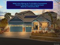 Charming single-Gathering home featuring a three car garage and covered front porch at 23327 E Ottawa Dr, Aurora, CO 80016