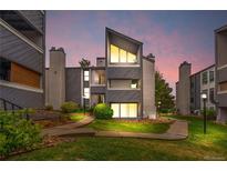 Striking condo exterior with modern architectural details and well-maintained landscaping at 9837 E Peakview Ave # D05, Englewood, CO 80111
