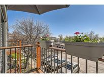 A cozy balcony with flower boxes adds charm to the outdoor space at 16259 W 10Th Ave # J5, Golden, CO 80401