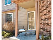 Inviting front porch with chair, perfect for enjoying the outdoors at 886 Summer Dr, Highlands Ranch, CO 80126