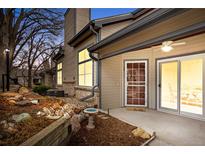 Inviting entryway with a well-maintained exterior, manicured landscaping, and a welcoming front door at 4301 S Pierce St # 6D, Littleton, CO 80123