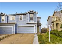 Charming two-story home with a two-car garage and well-maintained landscaping at 11120 Josephine Way, Northglenn, CO 80233