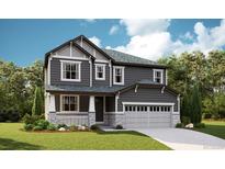 Charming two-story home with gray siding, stone accents, a covered porch, and a two-car garage at 1391 Lumber Ridge N Cir, Erie, CO 80516