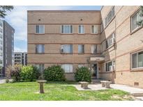 Building exterior with landscaping and a sitting area at 1101 Bellaire St # 204, Denver, CO 80220