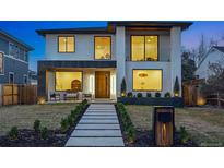 Striking modern home with clean lines, large windows, and professionally landscaped front yard at 1518 S Columbine St, Denver, CO 80210