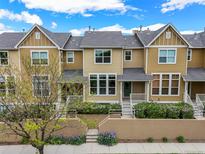 Attractive townhomes with inviting entrances, complemented by beautiful landscaping at 3712 Wolff St, Denver, CO 80212