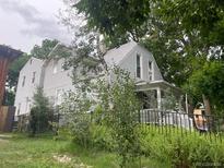Charming two-story home with vinyl siding and well-maintained landscaping at 3098 W 39Th Ave, Denver, CO 80211