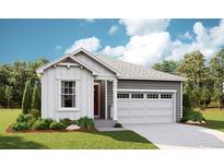 Charming single-Gathering home featuring a two-car garage, well-maintained lawn, and a welcoming entrance at 1321 Rock Cliff Ave, Erie, CO 80516
