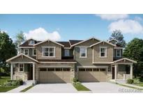 Charming townhome with a two-car garage, covered front porch and attractive architectural details at 6759 Juniper Dr, Thornton, CO 80602