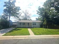 Charming single-story home with a well-maintained front yard and a convenient carport at 7331 Clay St, Westminster, CO 80030