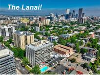 Stunning aerial view of the city skyline from this apartment complex featuring a sparkling community pool at 800 N Washington St # 508, Denver, CO 80203