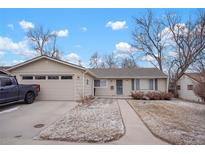 Charming single-story home with attached two-car garage and a well-maintained lawn at 3401 S Glencoe St, Denver, CO 80222