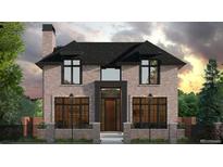 Charming two-story brick home with black framed windows and a manicured front yard at 1193 S York St, Denver, CO 80210